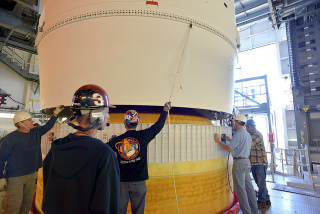 Illustration for article titled The Orion Spacecraft Is At the Launch Pad And Strapped To Its Rocket